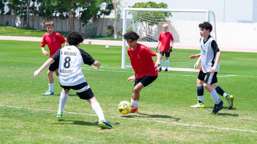 boys playing football