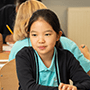 a Primary School student sitting in class