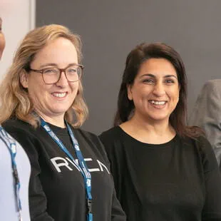 School staff standing together