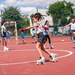 Girls skating in playground