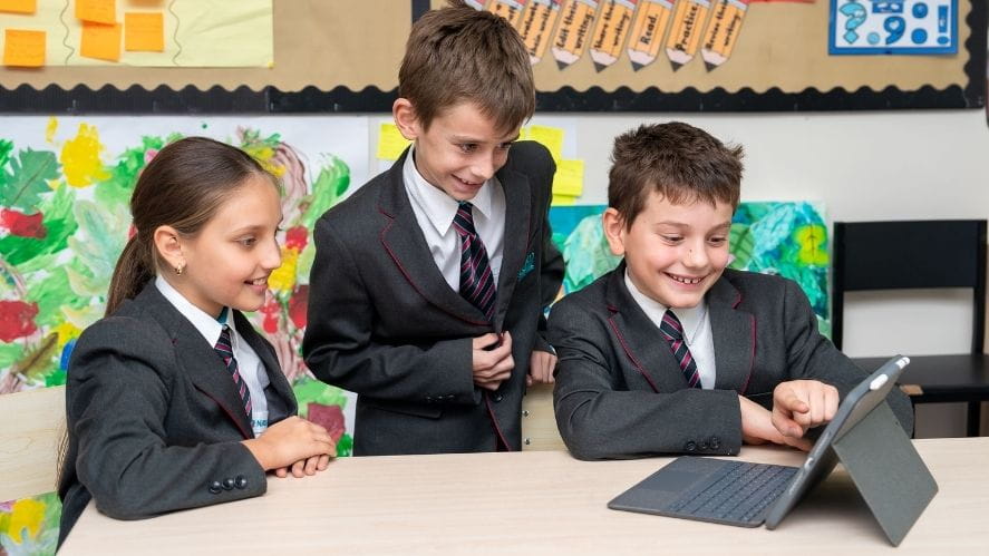 NAS Dubai students using technology in a modern classroom