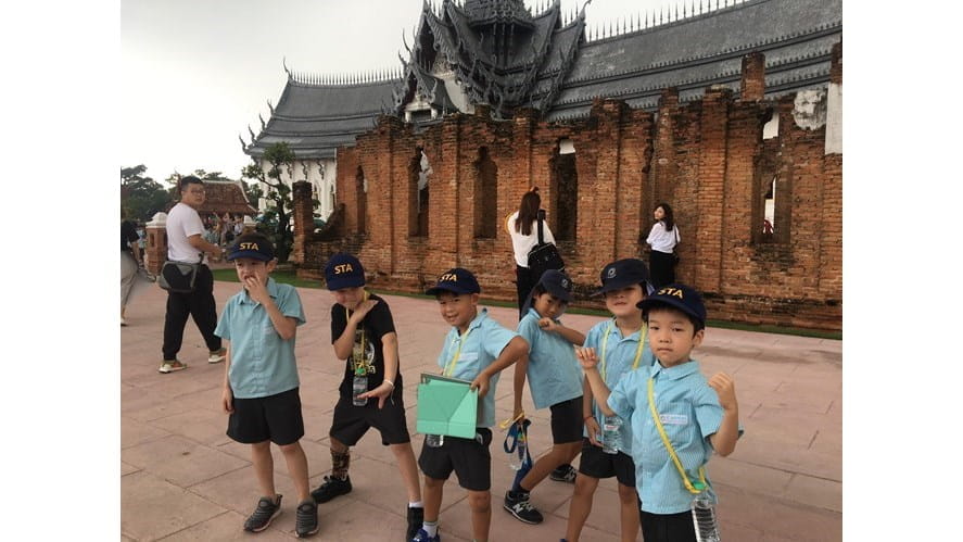 Boys posing at temple